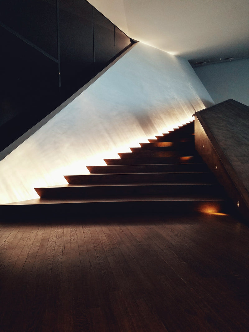 Modern staircase with built-in lighting in a minimalistic setting in EYE Filmmuseum, Amsterdam, Netherlands