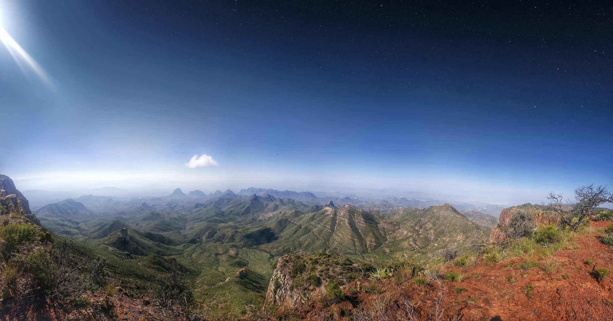 Panoramic view of a mountainous landscape with clear blue sky in Big Bend National Park, TX