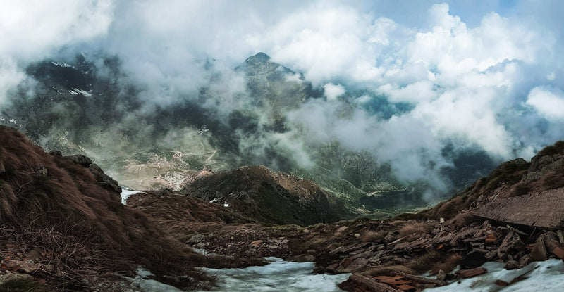 Mountain landscape with a river and clouds in Monte Mucrone, Italy