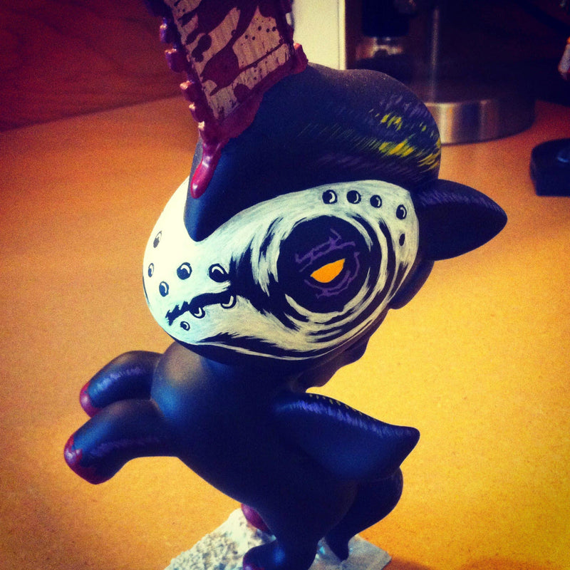 Custom-painted Tokidoki Unicorno. "MurderCorno" is a a horror-themed customization featuring a skull pattern and dark color scheme, inspired by Murdercorn by Biotwist.