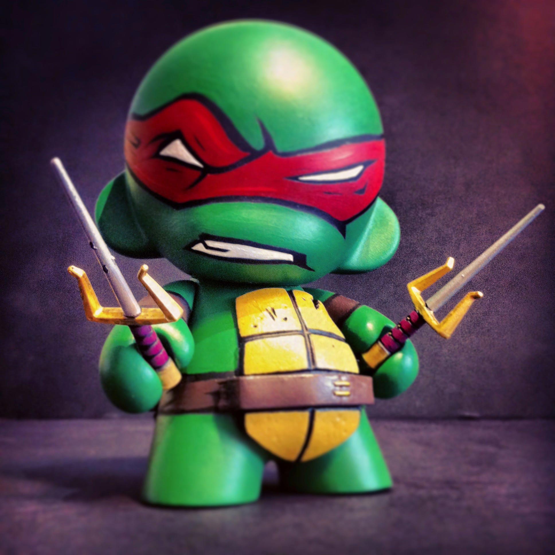 Custom-painted Raphael vinyl figure from the Teenage Mutant Ninja Turtles. The base figure is a Kidrobot DIY MUNNY